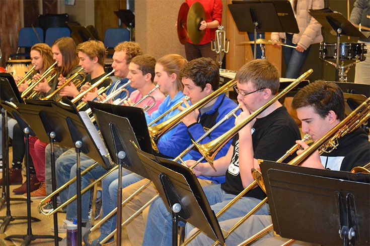 CMH musicians play their instruments