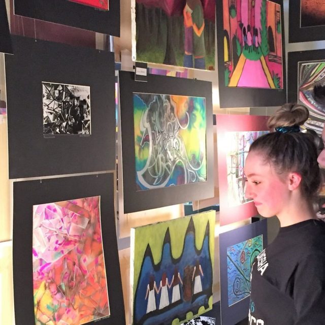 CMH students look at artwork